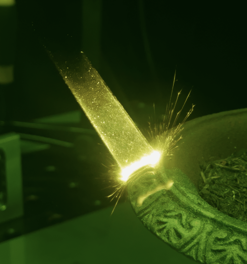 beam of a laser cleaner on an surface